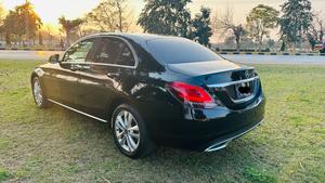 Mercedes-Benz C180 avantgrade-S  package ( twin turbo charged)
Model 2019 ( original facelift)
Registered Islamabad 2020
Shahnawaz import 
Mileage 13000
Brand New condition ( bumper to bumper original & spotless)
Full service history in shahnawaz Lahore. Only one moter oil changed.
Colour Black with beige nappa leather interior.
Top of line specs.
Electric Panoramic sunroof 
Premium entertainment sound system 
Electric power seats 
8 zone climate control air conditioning 
54 colours ambient interior lighting 
Adapted cruise control 
360 degrees cameras
Auto Parktronic access 
Multi drivetonic sensors
Multiple driving selection 
LED adapter headlights 
Apple CarPlay & android apps 
Crome line  packages 
18” alloy wheels 
Privacy glass 
Further information please call & visit Victory Cars jail road Lahore.
National wide delivery available.