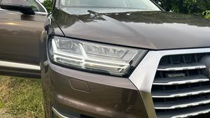 Audi Q7  Quattro. 3.0 V6 supercharged intercooler.360 Bhp
Exclusive premium plus business package 
Audi Pakistan import 
Model 2018 registered 2018 Karachi 
First owner driver, Audi services mentioned & full service history.
Mileage 54000
Pearl brown metallic colour & beige arocco nappa leather interior 
Top of the line specs.
Bumper to bumper original condition & spotless 
Seven seater all seats are electric multi power 
Panoramic sunroof 
Soft closer electric doors
Front seat air conditioning & heated 
12 zone duel climate control air conditioning system 
Bose entertainment sorround sound system with 29 speakers 
Airmatic suspension with Hight control 
360 degrees multi cameras 
Electric telescopic steering wheel 
Adapted cruise control 
Active adapted laser led headlamps 
Multi control Ambient interior light 
Power boot
Wireless charger 
9 tronic multi electric transmission 
Multi windows privacy curtains
19 “ alloy wheels with new tyres 
And lot of options installed.
Further i