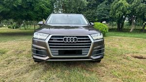 Audi Q7  Quattro. 3.0 V6 supercharged intercooler.360 Bhp
Exclusive premium plus business package 
Audi Pakistan import 
Model 2018 registered 2018 Karachi 
First owner driver, Audi services mentioned & full service history.
Mileage 54000
Pearl brown metallic colour & beige arocco nappa leather interior 
Top of the line specs.
Bumper to bumper original condition & spotless 
Seven seater all seats are electric multi power 
Panoramic sunroof 
Soft closer electric doors
Front seat air conditioning & heated 
12 zone duel climate control air conditioning system 
Bose entertainment sorround sound system with 29 speakers 
Airmatic suspension with Hight control 
360 degrees multi cameras 
Electric telescopic steering wheel 
Adapted cruise control 
Active adapted laser led headlamps 
Multi control Ambient interior light 
Power boot
Wireless charger 
9 tronic multi electric transmission 
Multi windows privacy curtains
19 “ alloy wheels with new tyres 
And lot of options installed.
Further i