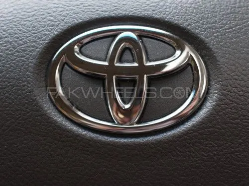 Toyota Corolla 2008-2025 genuine steering wheel logo emblem monogram