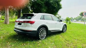 Audi E-tron 50 Quattro SUV 
Model 2020/12 registered Lahore 2021
Audi showroom delivery February 2021.
Mileage 46000
Excellent condition 
First owner driven 
Colour Diamond White metallic with Carrara brown leather interior.
Top of line specs.
Panoramic sunroof 
Privacy curtains
Bang & Olufsen surround sound system 
Multi climate control air conditioning 
Heating seats
21 inches allow wheels & brand new tyres replace.
Further information please call & physical visit at Victory Cars jail road Lahore.
National wide delivery available