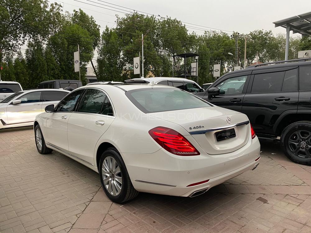 Mercedes Benz S400h 
Model: 2018
Reg: 2018 Karachi
Mileage: 40,700 kms 
Shahnawaz Import & Maintained

Equipment package: Executive 
Diamond White with two tone interior
Panoramic sliding roof 
Long wheel base 
360 degree camera 
Heated + memory seats 
Rear + side curtains 
Sun protection package
Dynamic LED Headlamps
Air Quality package
Rear Entertainment Package
Parking Assist
Ambient Lighting Package
Black Headliner Interior Trim
Memory Rear seat
Trim Pieces Wood Burred Walnut veneer
Premium Sound System- Burmester

Calling and Visiting Hours 

Monday to Saturday

11:00 AM to 7:00 PM