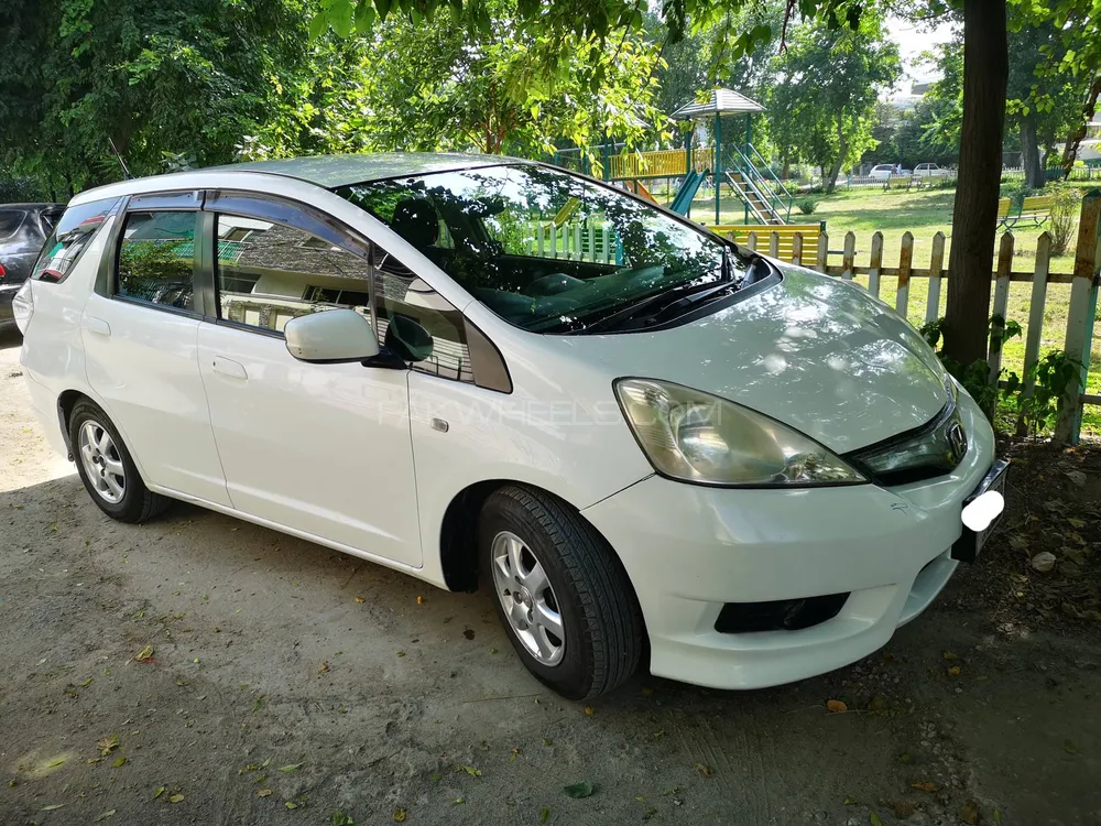 Honda Fit Shuttle Hybrid 1.3 2012 for sale in Islamabad PakWheels