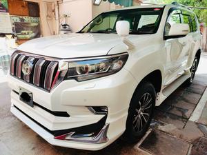 Toyota Prado TXL 2700cc
Model 2021 fresh import 2024
Unregistered 
5AA auction sheet
Pearl white with beige leather interior 
7 seater with sunroof 
Full body kit 
Further information please call & visit at Victory Cars jail road Lahore.