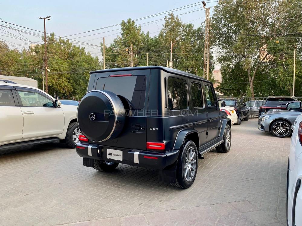 Mercedes Benz G63 AMG
V8 4.0 litre Biturbo
Model year 2020
Manufacturing Year 2019 end 
Fresh Import 2024
Milage 19000km 
Japan import
Satin black colour with red napa leather interior 


OPTIONS
•Active Lane Keeping Assist
•Red AMG brake callipers 
•Blind Spot Monitor
•Driver Assistance package Plus
•Smartphone integration CarPlay
•Sunroof
•Ambient lighting 
•Digital instrument cluster 
•360° camera
•Wider wheel arch for AMG wheels
•Parking package
•Switchable exhaust system
•AMG Performance steering wheel
•AMG Speedshift Plus 9G-Tronic
and many more options

Calling and Visiting Hours

Monday to Saturday

11:00 AM to 7:00 PM