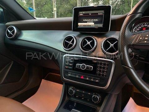 Mercedes GLA 200 AMG
Model: 2015
Mileage: 9,000 Km
Reg: 2015 Khi

Top of the line:
*Panoramic Roof
*Bucket leather seats
*Memory package 
*Privacy tint 
*Sports suspension 
*Leather dashboard