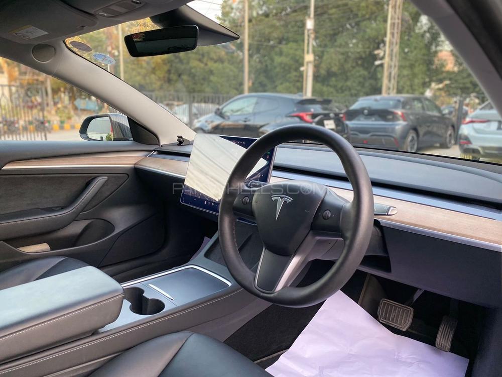 Make: Tesla Model 3
Long Range Edition
Model: 2021
Mileage: 42,000 Km
Unregistered 
Import: 2024

Calling and Visiting Hours

Monday to Saturday

11:00 AM to 7:00 PM