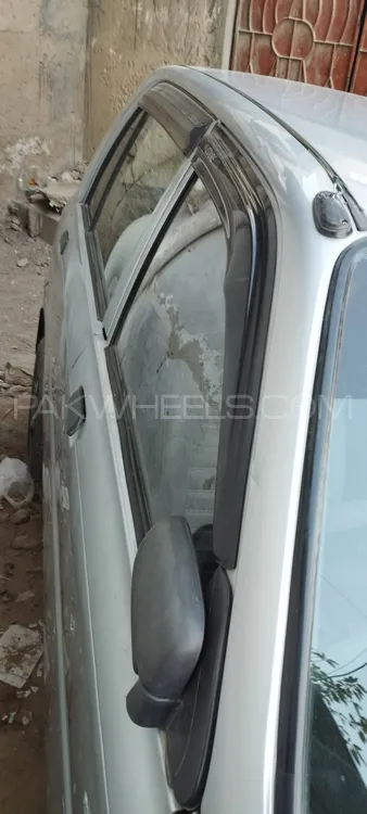 Daihatsu Cuore 2012 for Sale in Karachi Image-1