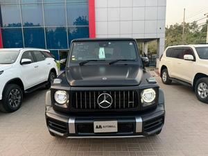 Mercedes Benz G63 AMG
V8 4.0 litre Biturbo
Model year 2020
Manufacturing Year 2019 end 
Fresh Import 2024
Milage 19000km 
Japan import
Satin black colour with red napa leather interior 


OPTIONS
•Active Lane Keeping Assist
•Red AMG brake callipers 
•Blind Spot Monitor
•Driver Assistance package Plus
•Smartphone integration CarPlay
•Sunroof
•Ambient lighting 
•Digital instrument cluster 
•360° camera
•Wider wheel arch for AMG wheels
•Parking package
•Switchable exhaust system
•AMG Performance steering wheel
•AMG Speedshift Plus 9G-Tronic
and many more options

Calling and Visiting Hours

Monday to Saturday

11:00 AM to 7:00 PM