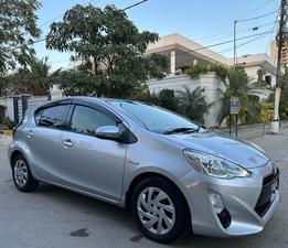 TOYOTA AQUA S KEY START MULTI PACKAGE NEW SHAPE (1500cc)
Model 2015 || Registered 2019 end
Silver Color
1/2 pc touchup 
99,000 KMS Driven
New Blue Interior
Climate control A/c
Multi Steering
100% BATTERY AND ABS  
Radar 
Interior is as crispy as new 
Still Smells Like New 
Extremely good condition 
Just like a brand new car
EXCHANGE POSSIBLE WITH ANY CAR
 
For inspection
Available at SUPREME CARS
Plot # 151/F,Under Imam heights,Shop no.1&2, Main Khalid Bin Walid Rd, Karachi, Sindh 75400

|  Premium Cars  |  Best Prices  |  Optimum Performance | 
#supremecarsgang