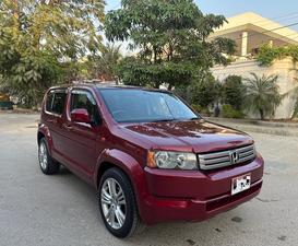 HONDA CROSSROAD 1.8 L X PACKAGE TOP OF THE LINE (1800CC) 7 Seater
Model 2010 end || Registered 2015
ONLY 120,000 KM DRIVEN 
Wine Red Color
Bumper To Bumper Original 100% Guaranteed 
Original TV BACK CAM
Multis Steering 
Lexus Rims Installed
As good as brand new
Extremely well maintained 
Just like new

For inspection 
Available at SUPREME CARS
Plot # 151/F,Under Imam heights,Shop no.1&2, Main Khalid Bin Walid Rd, Karachi, Sindh 75400

|  Premium Cars  |  Best Prices  |  Optimum Performance | 
#Supremecarsgang