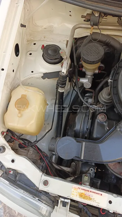 Daihatsu Cuore 2012 for Sale in Charsadda Image-1