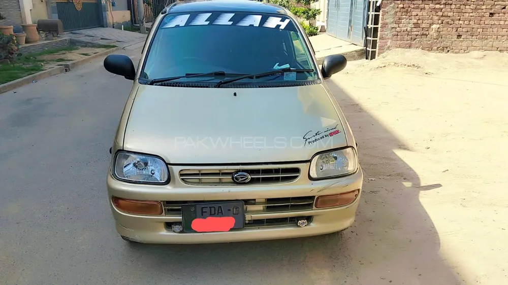 Daihatsu Cuore 2009 for Sale in Faisalabad Image-1