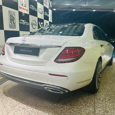 Mercedes-Benz E180 Exclusive luxury package.
Model 2021 registration Karachi 2021
Shahnawaz import & mentioned 
Mileage 15000 km
Excellent condition 
Polor white with beige nappa leather interior.
Top of the line specs.
Further information please call & visit at Victory Cars jail road Lahore 
National wide delivery available