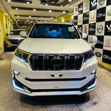 Toyota LandCruiser Prado TX-L 
Mode 2019 fresh import ( unregistered)
Mileage 33000 km
Pearl white with beige leather interior 
Brand new condition ( spotless)
Auction grade 4.5
7 seater with sunroof 
Top of line specs.
Nappa leather multi power seats with heated & ventilated ( air conditioning)
B/o premium entertainment sound system.
Multi cameras 
Customised fitting 
Crome package 
8 zone climate control air conditioning system 
Adapted active Radar 
Line accessed 
Adapted cruise control system 
All zone parktronic sensors 
Full body kit
18” alloy wheels with new tyres.
Further information please call & visit at Victory Cars jail road Lahore.