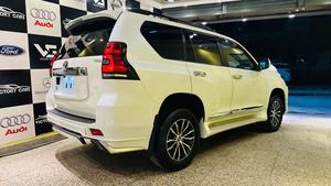 Toyota LandCruiser Prado TX-L 
Mode 2019 fresh import ( unregistered)
Mileage 33000 km
Pearl white with beige leather interior 
Brand new condition ( spotless)
Auction grade 4.5
7 seater with sunroof 
Top of line specs.
Nappa leather multi power seats with heated & ventilated ( air conditioning)
B/o premium entertainment sound system.
Multi cameras 
Customised fitting 
Crome package 
8 zone climate control air conditioning system 
Adapted active Radar 
Line accessed 
Adapted cruise control system 
All zone parktronic sensors 
Full body kit
18” alloy wheels with new tyres.
Further information please call & visit at Victory Cars jail road Lahore.