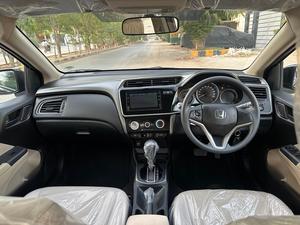 HONDA CITY 1.2L CVT (1200cc) AUTOMATIC 
Model 2024 || Registered 2024
8,000 KM Driven verifiable
HONDA SHAHRAH E FAISAL MAINTAINED 
Bumper To Bumper Original 100% 
Pearl Black Color 
Beige room
Interior is as good as new
COMPANY SEALS STILL INTACT
Original NAVIGATION 
ECON Mode
Like a brand new car

For inspection
Available at SUPREME CARS
Plot # 151/F,Under Imam heights,Shop no.1&2, Main Khalid Bin Walid Rd, Karachi, Sindh 75400

|  Premium Cars  |  Best Prices  |  Optimum Performance | 
#Supremecarsgang