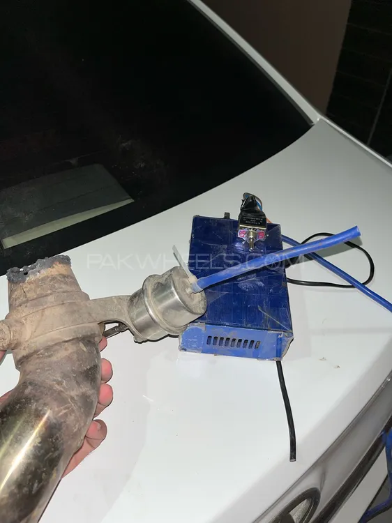 cut off exhaust on off with button in used condition totally working and delivery available  Image-1