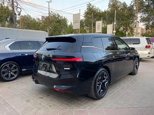 BMW iX Xdrive 50
Model: 2023
Mileage: 3,800 km
Un-Registered 
Japan Import

One & Only with 
530 Hp & 550 km Range

Black sapphire Metallic Colour 
with Tan Interior

*Wireless Apple carplay and android auto
*LED headlights 
*Ambient lights
*Four-zone climate control
*Comfort Access keyless entry 
*Bowers and wilkins sound System
*14.9-inch touchscreen infotainment system
*Active steering
*Soft closing doors
*BMW Natural Interaction voice assistant
*22-inch alloy wheels
*Front massage seats
*Panoramic glass roof sky lounge with electrochromatic shade function

Calling and Visiting Hours

Monday to Saturday

11:00 AM to 7:00 PM