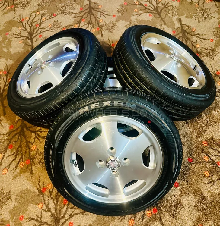 Nexen Tyres NPGX (165-65-14) And Honda Civic 2000 Genuine Alloy Rim in Original Condition Size 14 Image-1