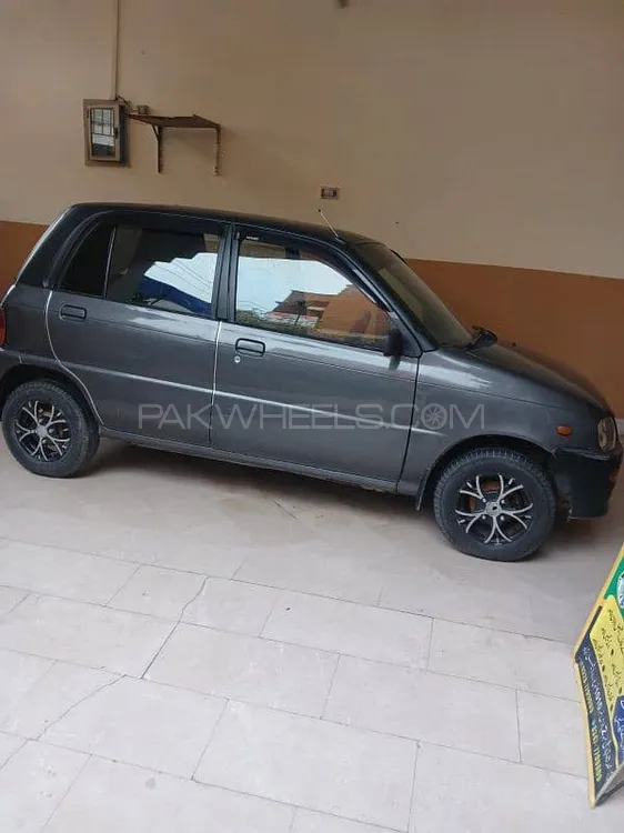 Daihatsu Cuore 2006 for Sale in Faisalabad Image-1