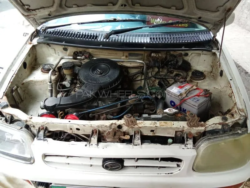 Daihatsu Cuore 2004 for Sale in Faisalabad Image-1