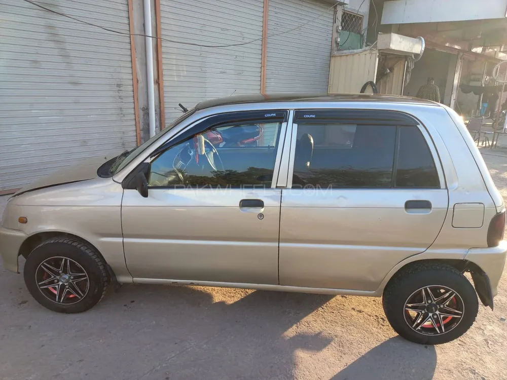 Daihatsu Cuore 2011 for Sale in Faisalabad Image-1