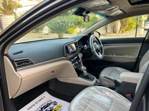 HYUNDAI ELANTRA GLS TOP OF THE LINE NEW RIMS (2000cc)
Model 2021 December || Registered 2022
Only 25,300 KM 100% Genuine 
Hyundai South Maintained 
Cyber Grey Color 
Bumper to bumper original guaranteed 100 %
TOP OF THE LINE
Original NEW TV Back Cam
Original NEW Leather Seats
Original NEW RIMS
Sunroof 
Wireless Charger
Dual Power Seats
Spare Wheel Unused 
Fog lights
Just Like Zero Meter 
All seals still intact 
See to Believe 
Ready Delivery 
EXCHANGE POSSIBLE WITH ANY CAR

For inspection
Available at SUPREME CARS
Plot # 151/F,Under Imam heights,Shop no.1&2, Main Khalid Bin Walid Rd, Karachi, Sindh 75400

|  Premium Cars  |  Best Prices  |  Optimum Performance | 
#supremecarsgang