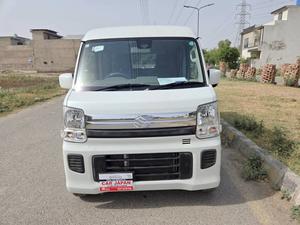 Fresh Import 2025
Every Wagon High Roof PZ TURBO Edition
Shiny White Colour
2019 Model
Parking Sensors
Push Start Engine
Radar Break Support 
No.1 Japan Quality
Drive Type: FF
Power Steering
Power Windows
Genuine Verifiable Auction Sheet
3.5 Auction Grade and Auction Sheet Attached For Satisfaction And Online Verification
According To Suzuki Motor Corporation Japan 20.2 Km/l
Power Mirror
Glass With Ultra-violet Filter
Central Locking
Air Conditioner & Heater
Dual Trip Meters
Height Adjustable Driving Seat
Front & Rear Defogger
Fuel Tank Capacity: 40 Litres
Steering: Power Assist Equipped Rack & Pinion
Height & Length Adjustable Steering Column
Drivers Airbag
Passenger Airbag
Central Locking
Folding Rear Seats
Rear Wiper
Glass With Ultraviolet Filter
Toned Glasses
SRS Air Bag
Power Window Lock
Window Rain Visors