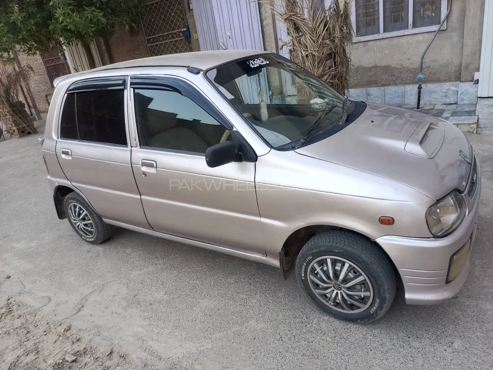 Daihatsu Cuore 2004 for Sale in Faisalabad Image-1