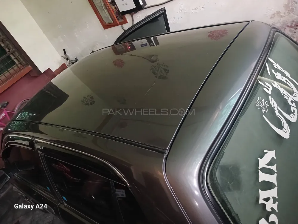 Daihatsu Cuore 2007 for Sale in Faisalabad Image-1