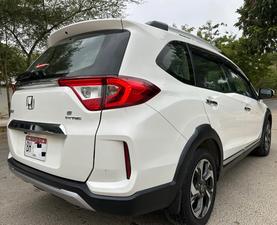 HONDA BRV S PACKAGE TOP OF THE LINE NEW SHAPE PUSH START LIMITED EDITION(1500cc)
Model 2020 || Registered 2020
Only Genuine 28,000 KM
Taffeta White Color
Bumper to Bumper Original 100%
Guaranteed 
Scratch-less Spotless  
Push start
Centre console/ Hand-rest
Automatic Transmission
Original TV NAV
Climate Control
New Grill 
Original Fog Lights
Genuine Rims
Just like Zero Meter
All Seals Still Intact 
EXCHANGE POSSIBLE WITH ANY CAR

For inspection
Available at SUPREME CARS
Plot # 151/F,Under Imam heights,Shop no.1&2, Main Khalid Bin Walid Rd, Karachi, Sindh 75400

|  Premium Cars  |  Best Prices  |  Optimum Performance | 
#supremecarsgang