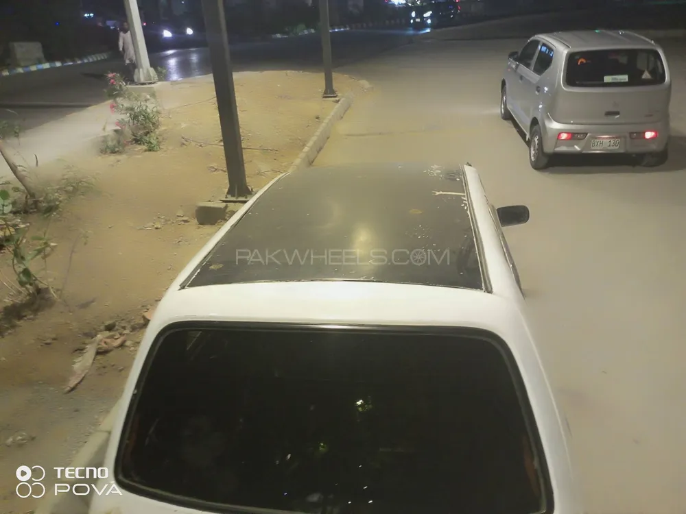 Daihatsu Cuore 2002 for Sale in Karachi Image-1