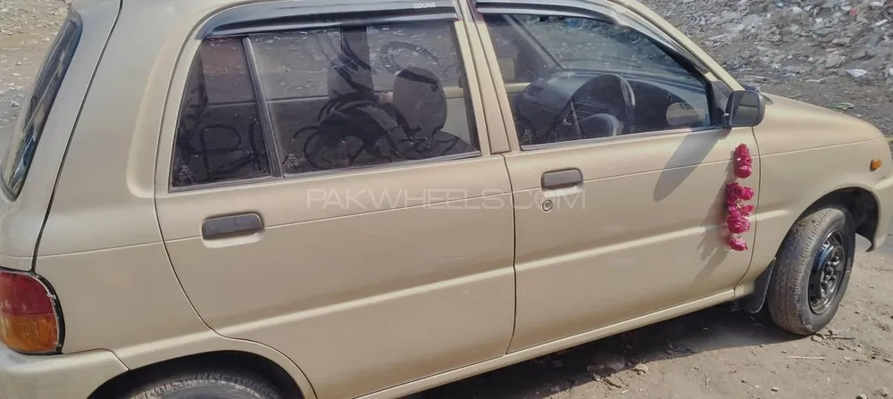 Daihatsu Cuore 2010 for Sale in Faisalabad Image-1