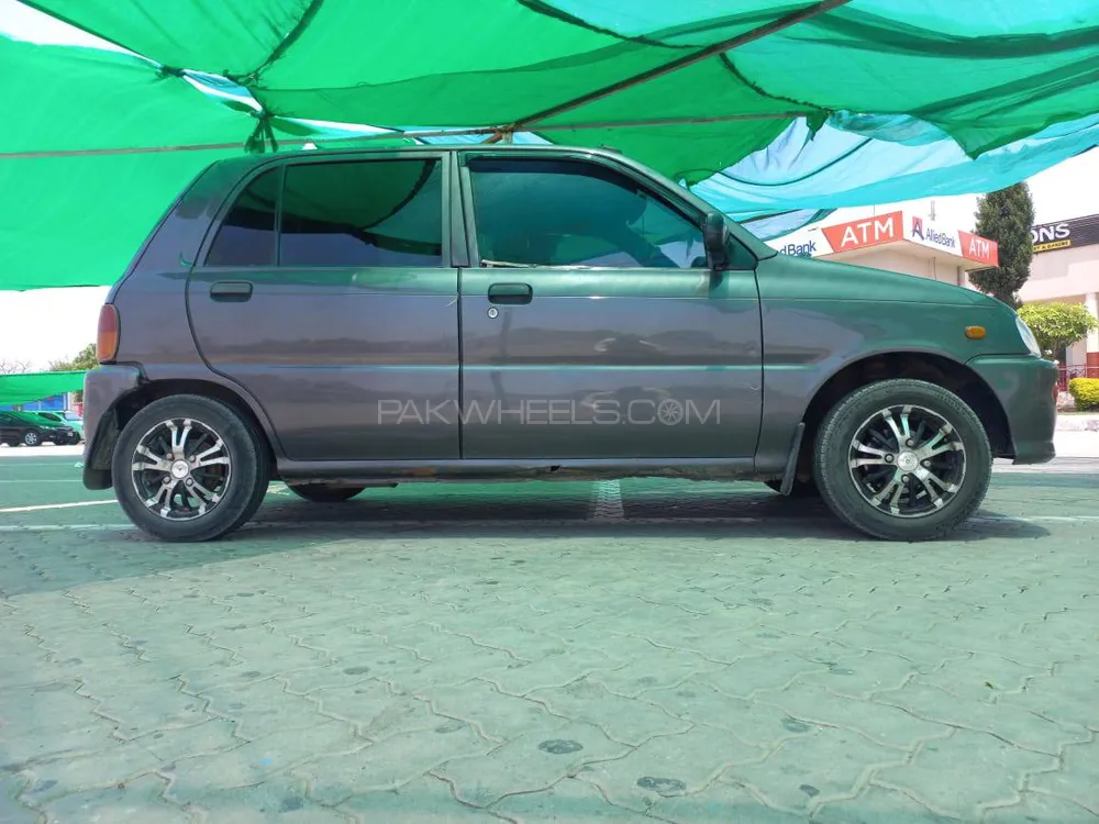 Daihatsu Cuore 2010 for Sale in Faisalabad Image-1