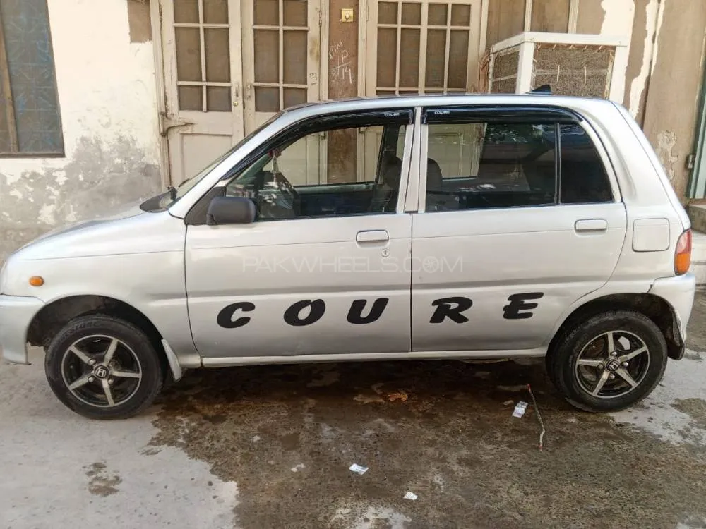 Daihatsu Cuore 2001 for Sale in Faisalabad Image-1
