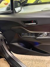 Toyota CH-R  1800cc hybrid 
G-led package 
Model 2019 fresh import 
Mileage 56000 km
Verified Auction sheet 
Pearl Bronze metallic colour with brown leather interior .
Bumper to Bumper original condition ( spotless)
Top of the line package 
Multi cameras 
Apple CarPlay, Bluetooth & android app. With 11 speakers 
Adapted Radar 
Blind spot monitor 
Line accessed 
Adapted cruise control 
19” alloy wheels 
Future information please call & visit Victory Cars jail road Lahore.