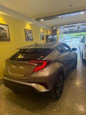 Toyota CH-R  1800cc hybrid 
G-led package 
Model 2019 fresh import 
Mileage 56000 km
Verified Auction sheet 
Pearl Bronze metallic colour with brown leather interior .
Bumper to Bumper original condition ( spotless)
Top of the line package 
Multi cameras 
Apple CarPlay, Bluetooth & android app. With 11 speakers 
Adapted Radar 
Blind spot monitor 
Line accessed 
Adapted cruise control 
19” alloy wheels 
Future information please call & visit Victory Cars jail road Lahore.