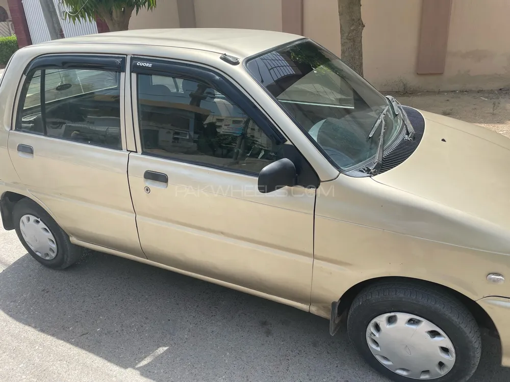 Daihatsu Cuore 2011 for Sale in Karachi Image-1