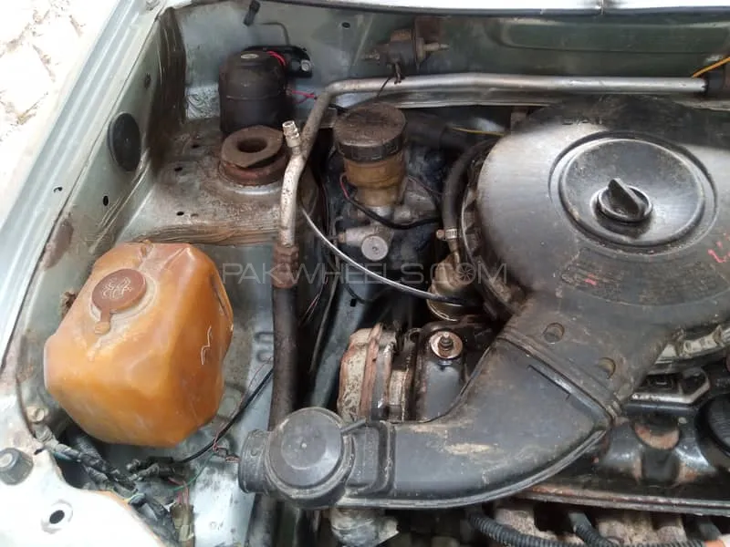 Daihatsu Cuore 2004 for Sale in Peshawar Image-1