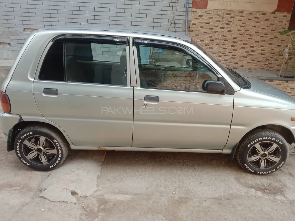 Daihatsu Cuore 2011 for Sale in Faisalabad Image-1