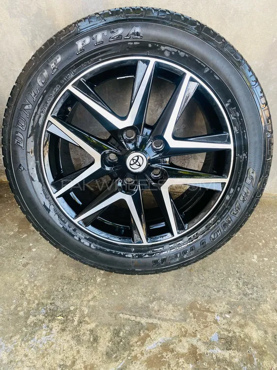 Land Cruiser sickness 2003 model 4 Rims and 3 Tyres good condition Image-1