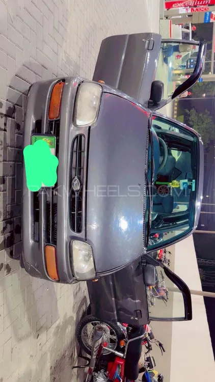Daihatsu Cuore 2010 for Sale in Lahore Image-1