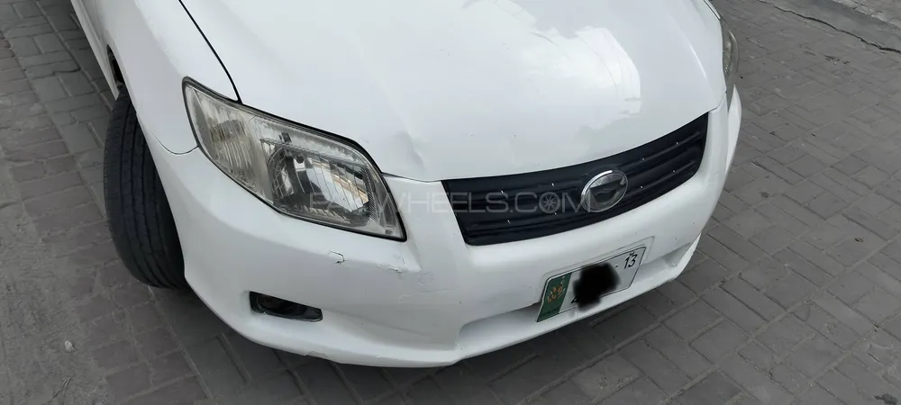 Toyota Corolla Axio 2013 for Sale in Faisalabad Image-1