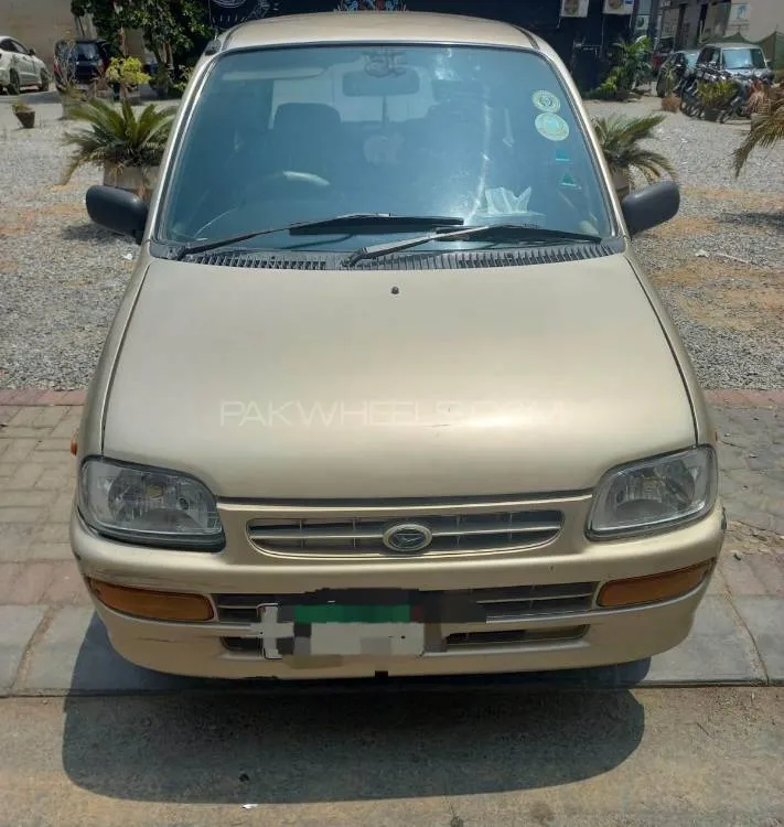 Daihatsu Cuore 2011 for Sale in Karachi Image-1