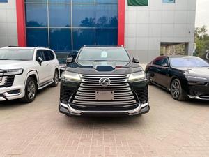 Lexus Lx 600 v6 twin turbo 
Model: 2022
Mileage: 7,700 km
Unregistered 
Fresh Import 2025 

Luxury variant:
*Finger print start button 
*Color heads up display
*Okudake (Wireless) charger 
*Back auto door 
*Rear view camera
*Under view camera 
*Rear entertainment 
*Mark levinson 3D sound system 
*Front & rear ventilated seats 
*Heating/Cooling seats
*Sunroof
*Radar
*7 seater

Calling and Visiting Hours

Monday to Saturday

11:00 AM to 7:00 PM