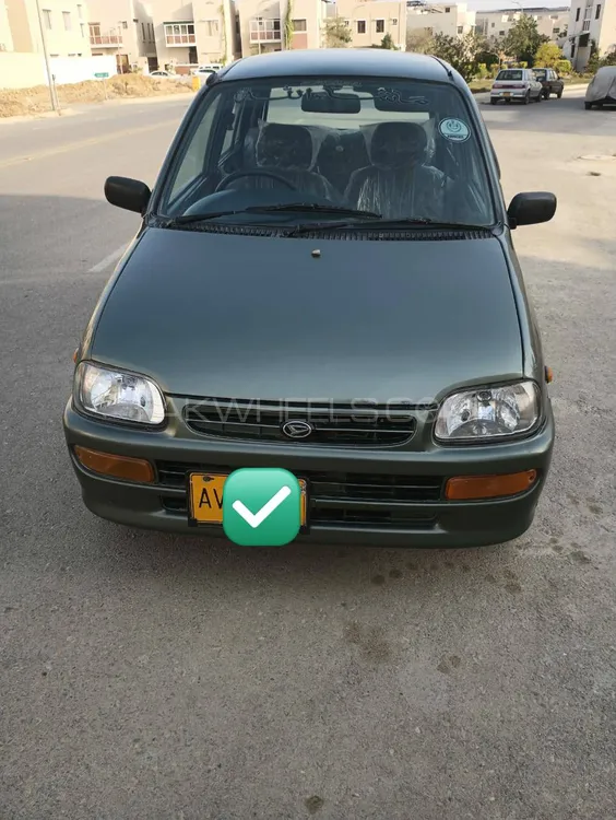 Daihatsu Cuore 2011 for Sale in Karachi Image-1