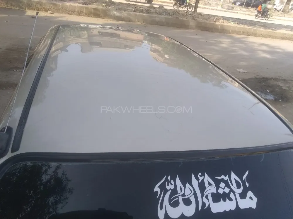 Daihatsu Cuore 2011 for Sale in Karachi Image-1