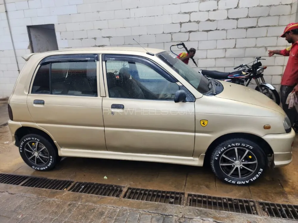 Daihatsu Cuore 2011 for Sale in Karachi Image-1