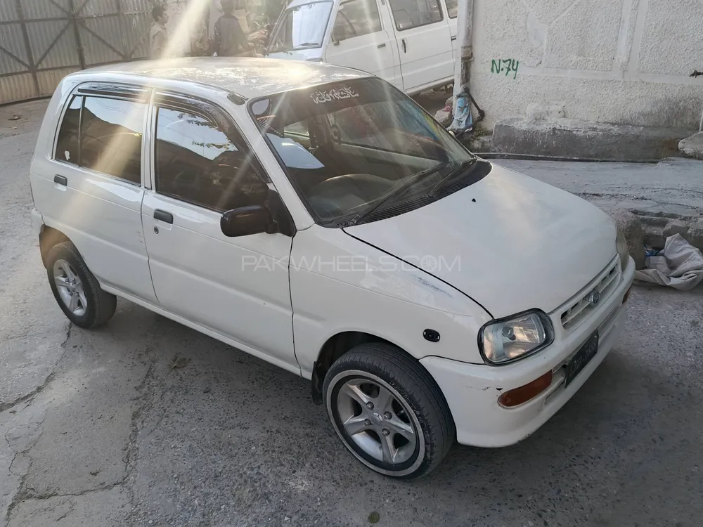 Daihatsu Cuore 2004 for Sale in Abbottabad Daihatsu Cuore 2004 for Sale in Abbottabad Image-2